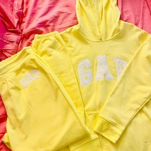 This yellow sweat suit is from GAP! The hoodie is Large and the pants are Medium